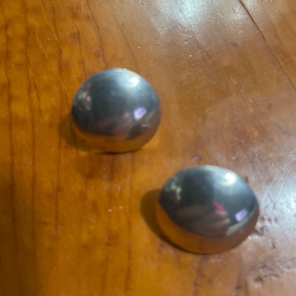 Classic Silver Dome Clip-On Earrings. Smooth polished finish.